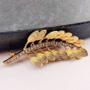 VINTAGE Gold tone brushed metal and clear rhinestone tree branch brooch pin